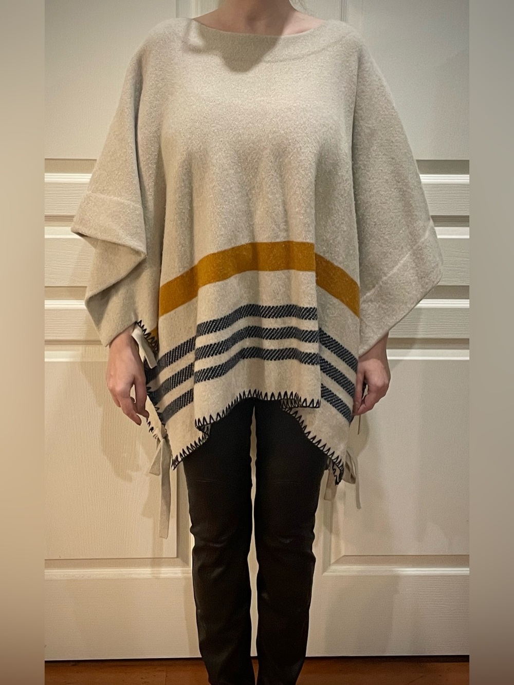 Chloe Cream Poncho with Mustard and Navy Stripe Accents; wool and cashmere.